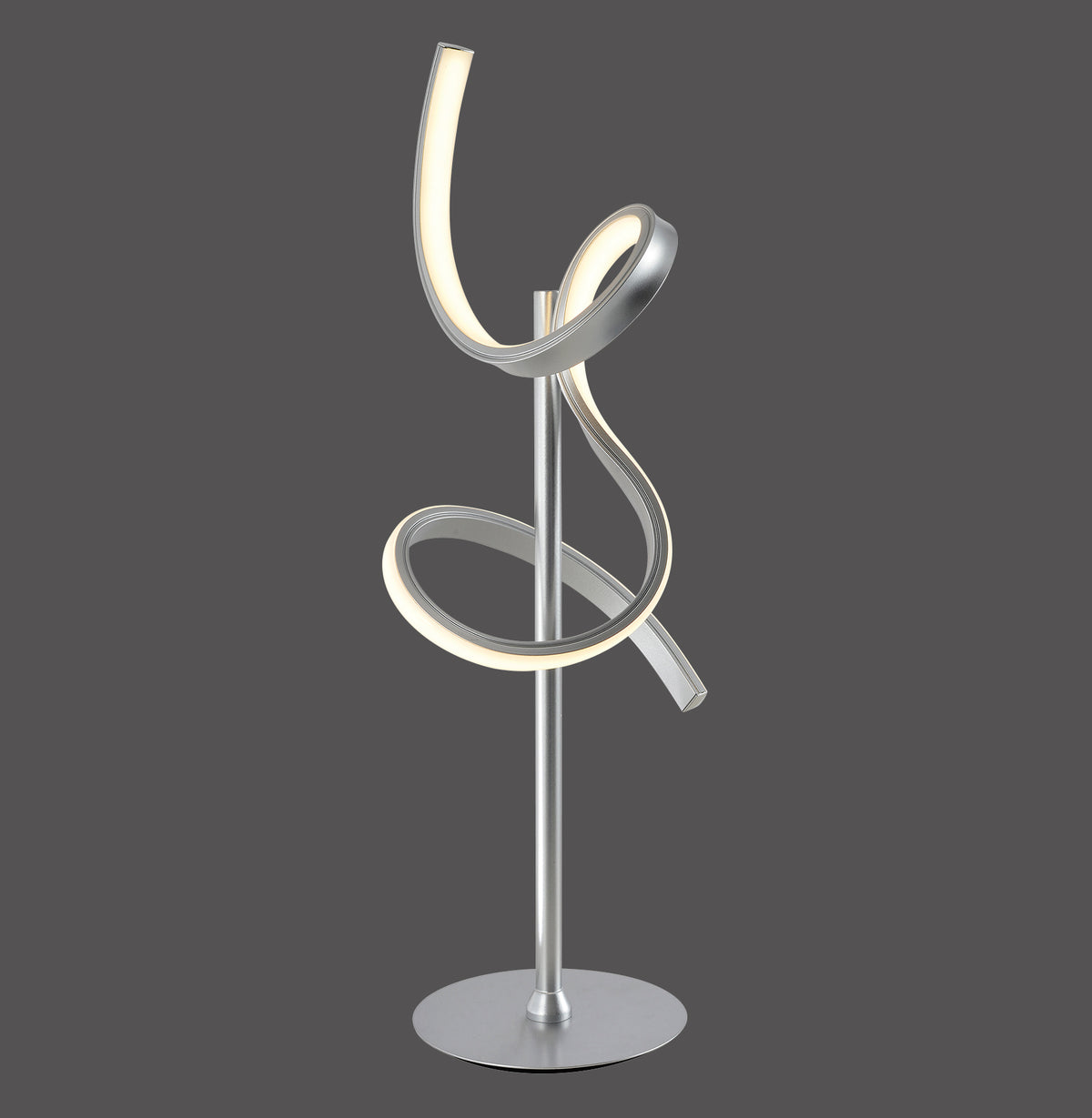Lampe à poser argentée vue de face sur fond gris anthracite, ruban LED spiralé