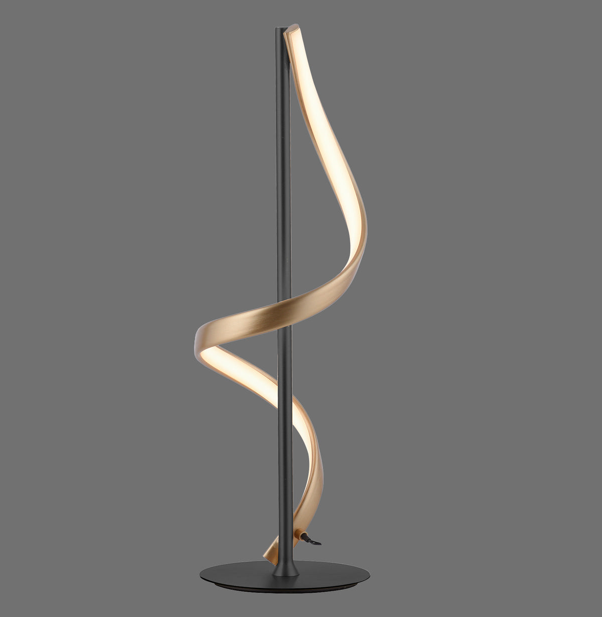 Vue de face de la lampe à poser, ruban doré en spirale autour d'un axe anthracite.