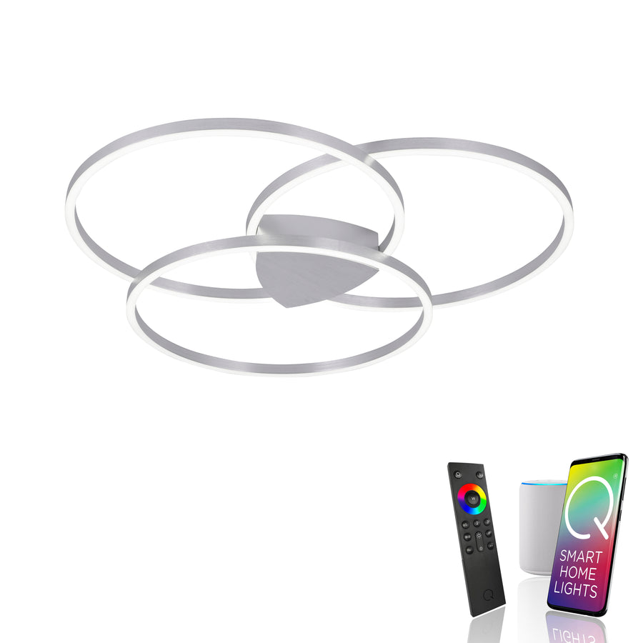 Anneaux lumineux avec télécommande, enceinte connectée et application smartphone sur fond blanc.