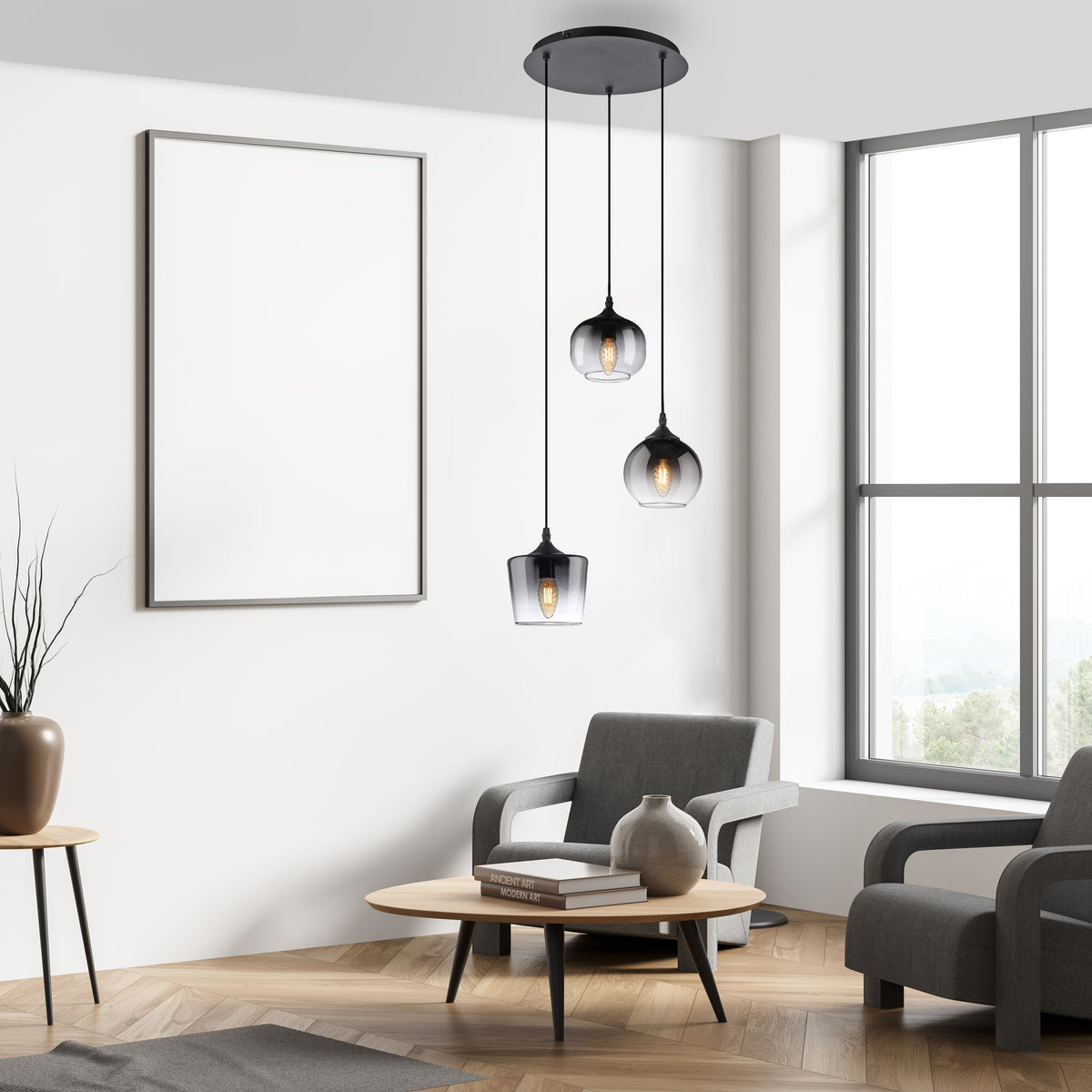 Mise en ambiance du luminaire suspendu dans un salon moderne avec fauteuil et cadre