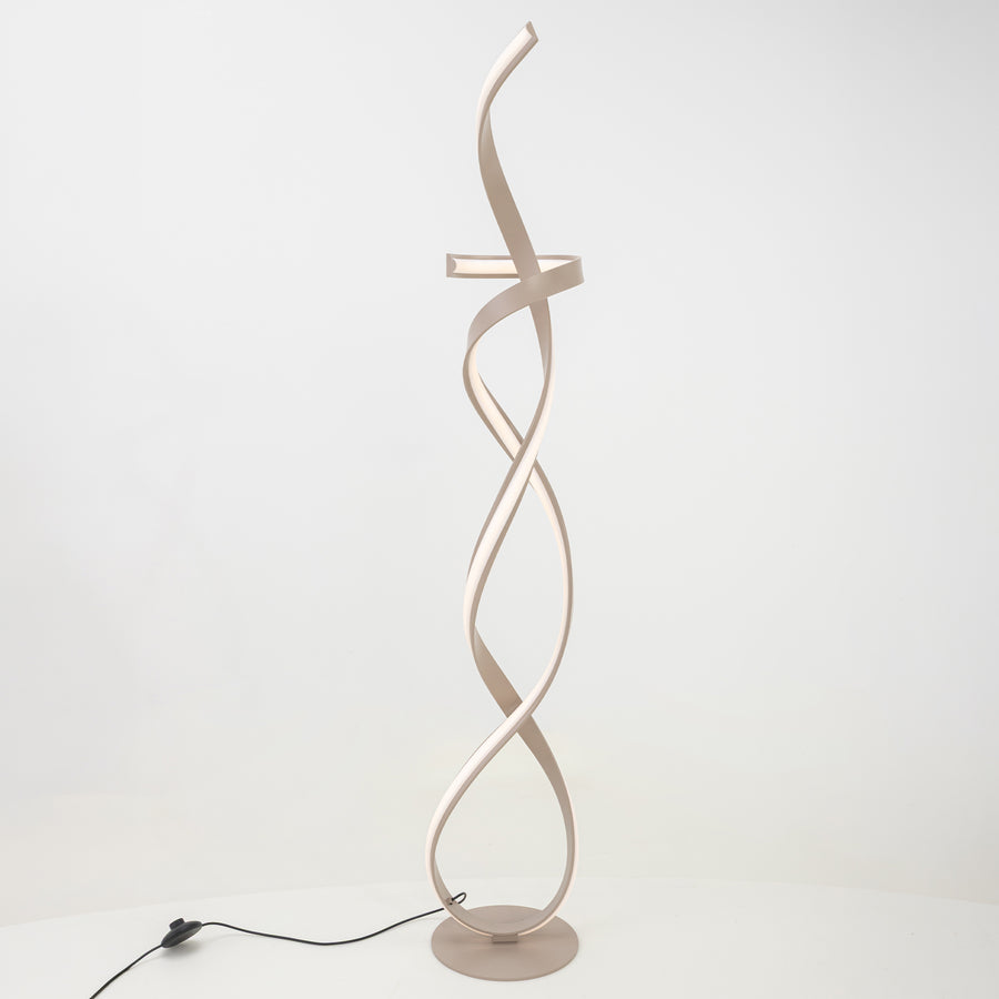 Lampadaire beige sculptural à ruban torsadé, vue de face sur fond blanc.