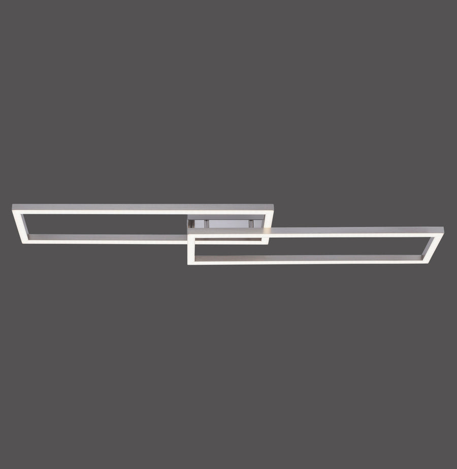 Luminaire plafonnier rectangulaire en acier, deux cadres fins décalés sur fond gris.