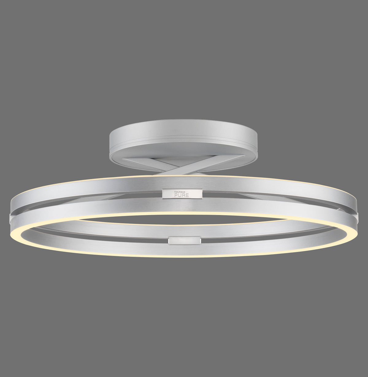 Luminaire rond en aluminium vu de face sur fond gris, anneau LED allumé
