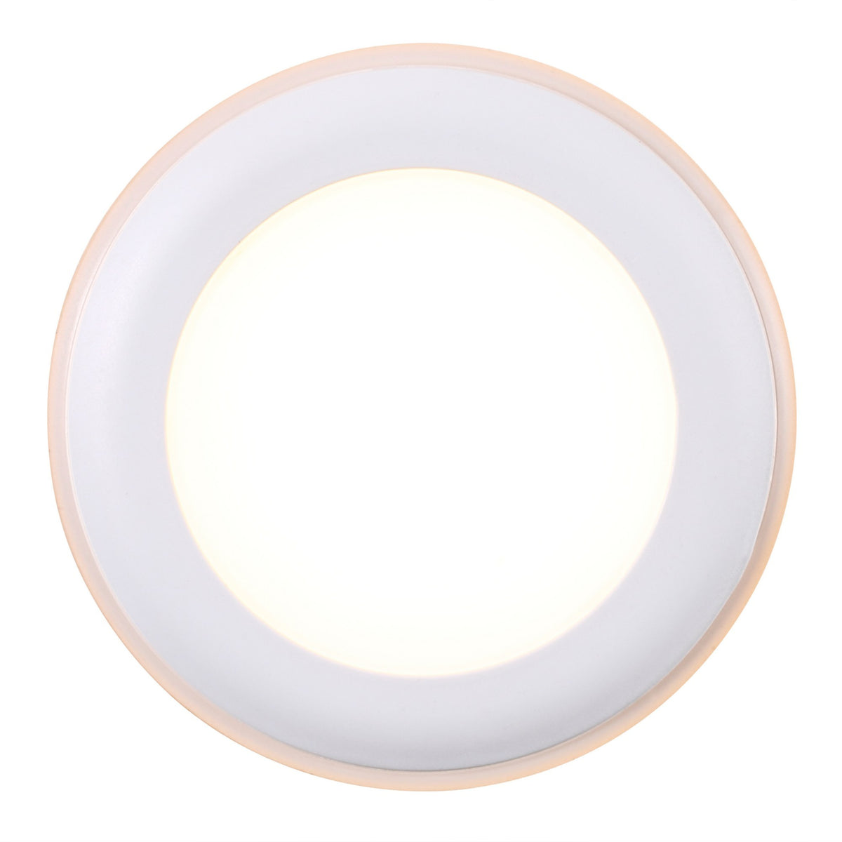 Vue de face allumée montrant le halo lumineux qui déborde sur le pourtour blanc