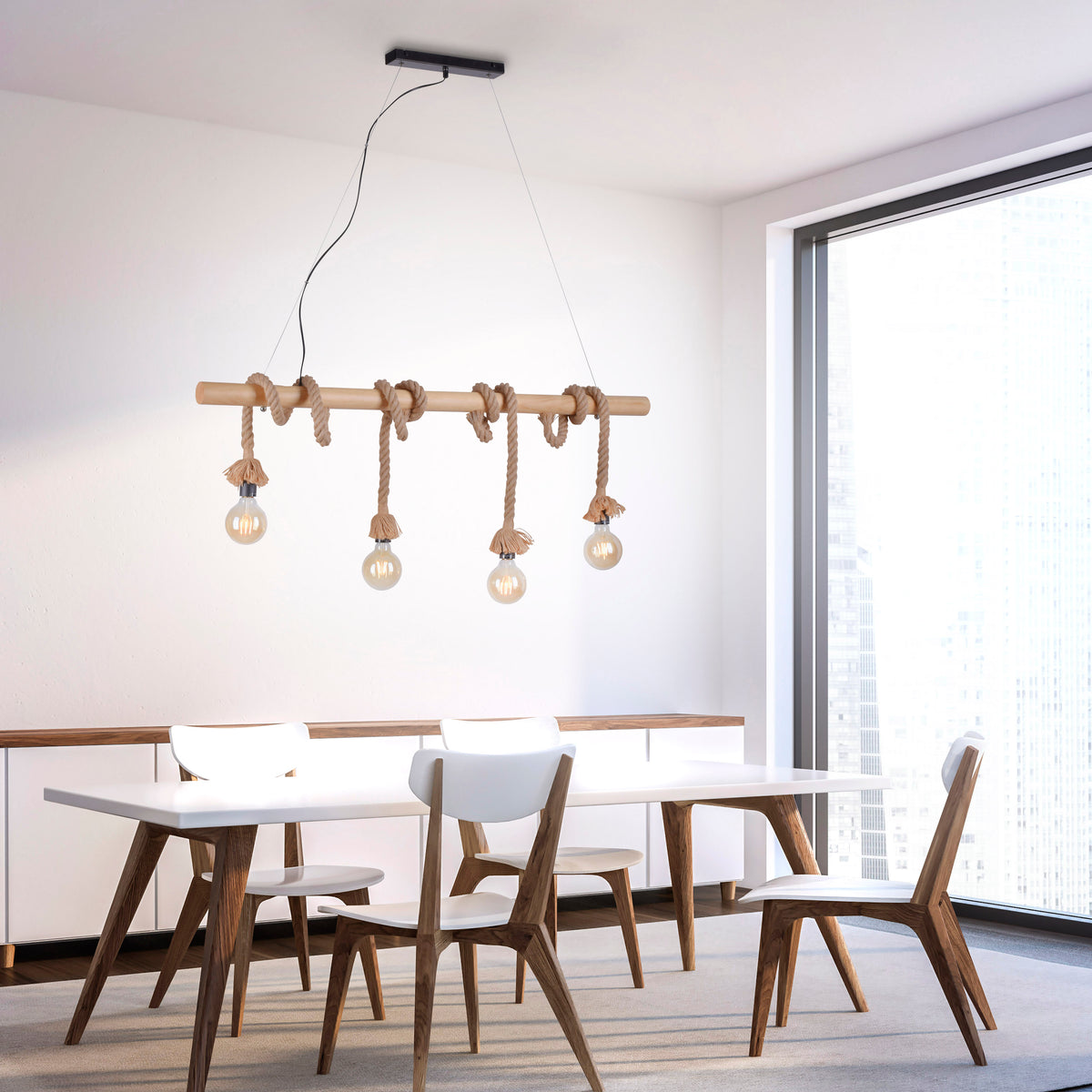 Mise en ambiance dans une salle à manger moderne, suspension au-dessus de la table.