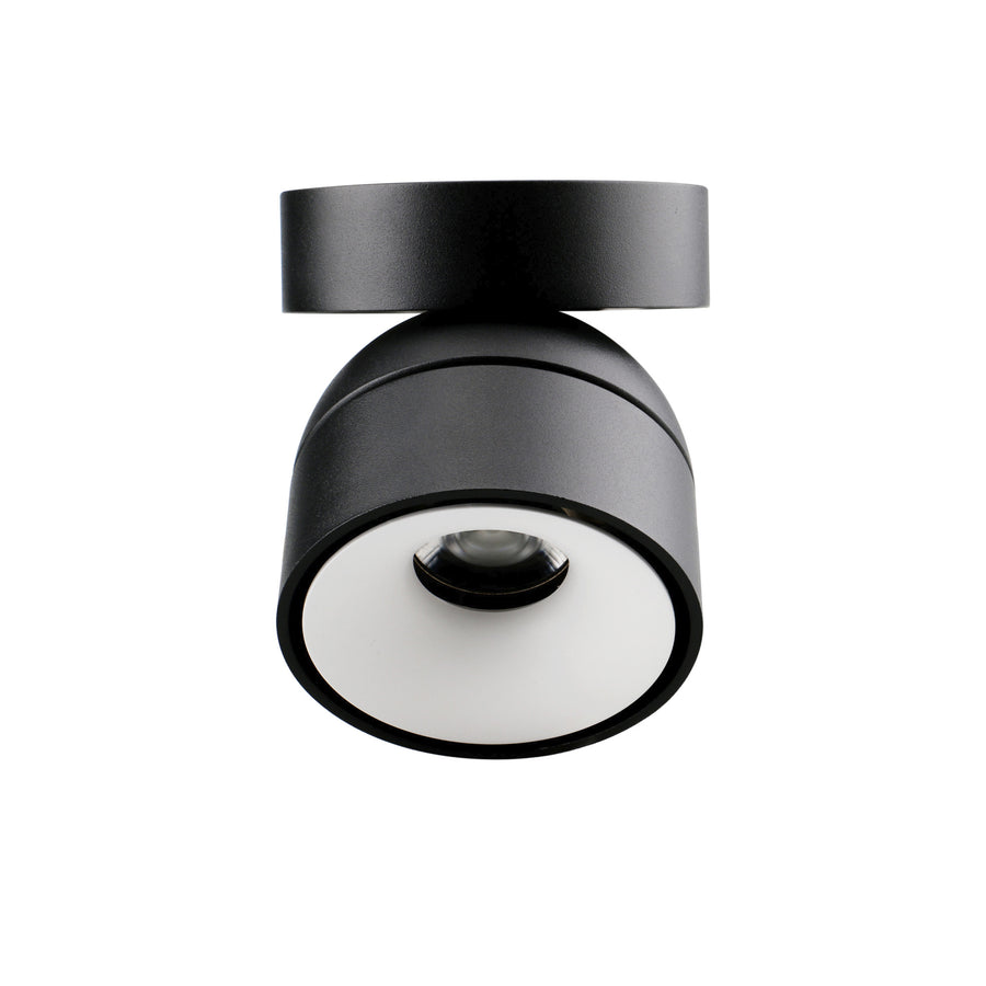 Vue de face du spot noir avec intérieur blanc et lentille.