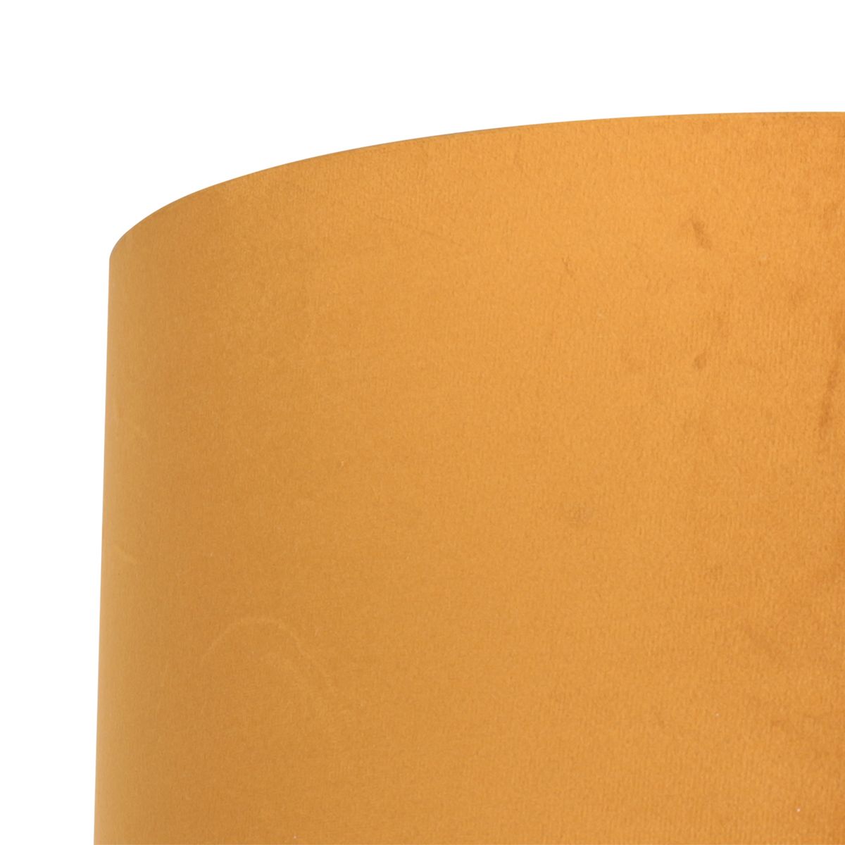 Gros plan sur la texture velours dorée et le bord supérieur arrondi