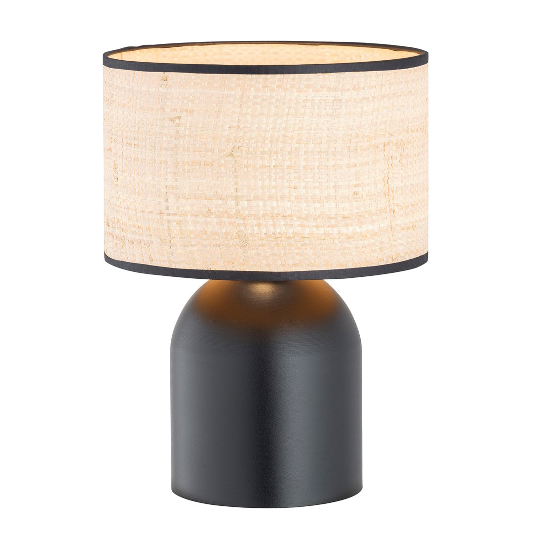 Lampe à poser noire de face, abat-jour cylindrique en fibres naturelles tressées, fond blanc