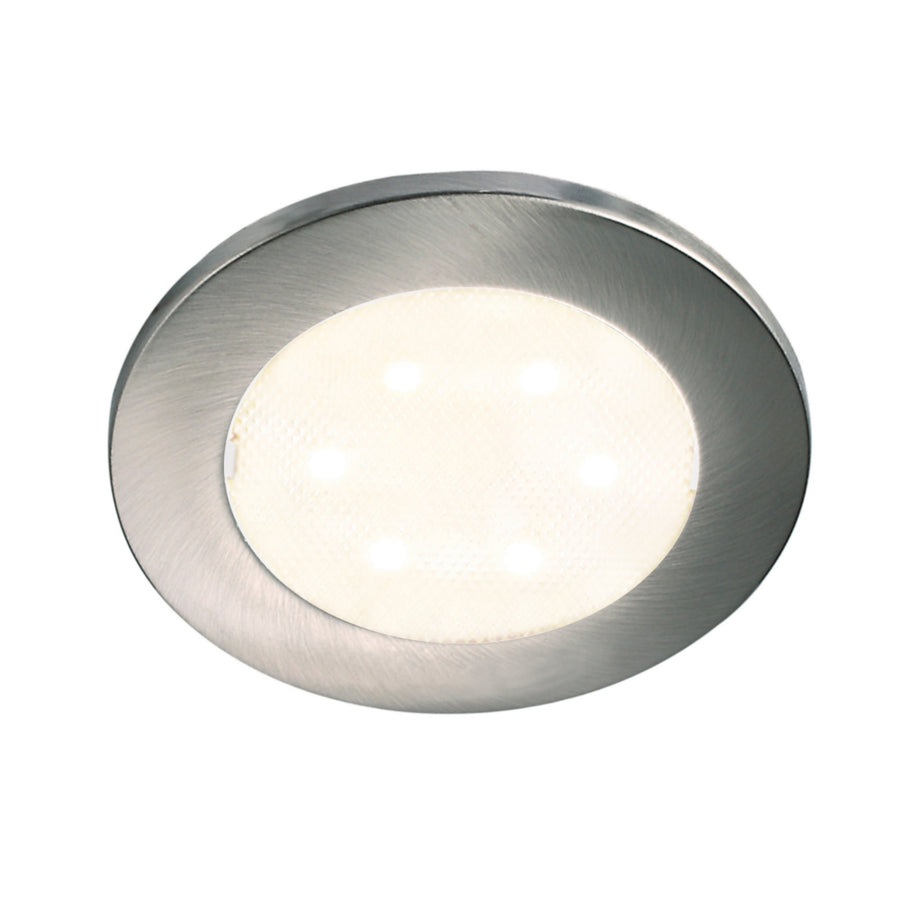 Gros plan d'un spot LED rond chromé avec diffuseur blanc et LED apparentes