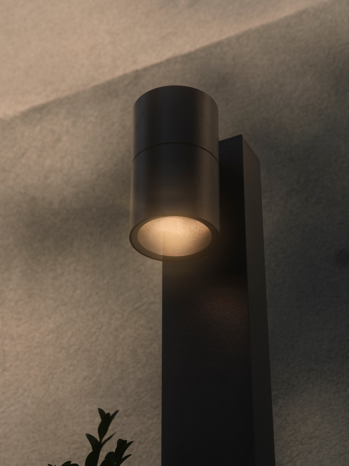 Détail rapproché de la tête cylindrique noire et de son verre dépoli éclairé