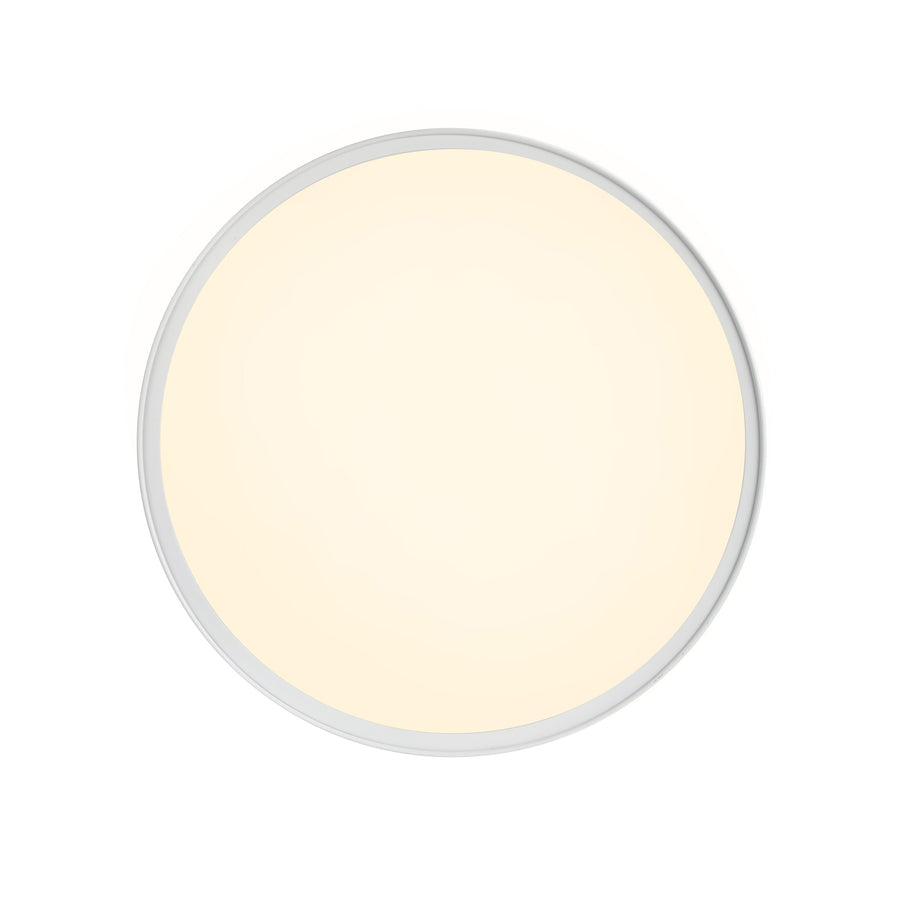 Vue de dessous montrant le diffuseur circulaire blanc uniformément lumineux