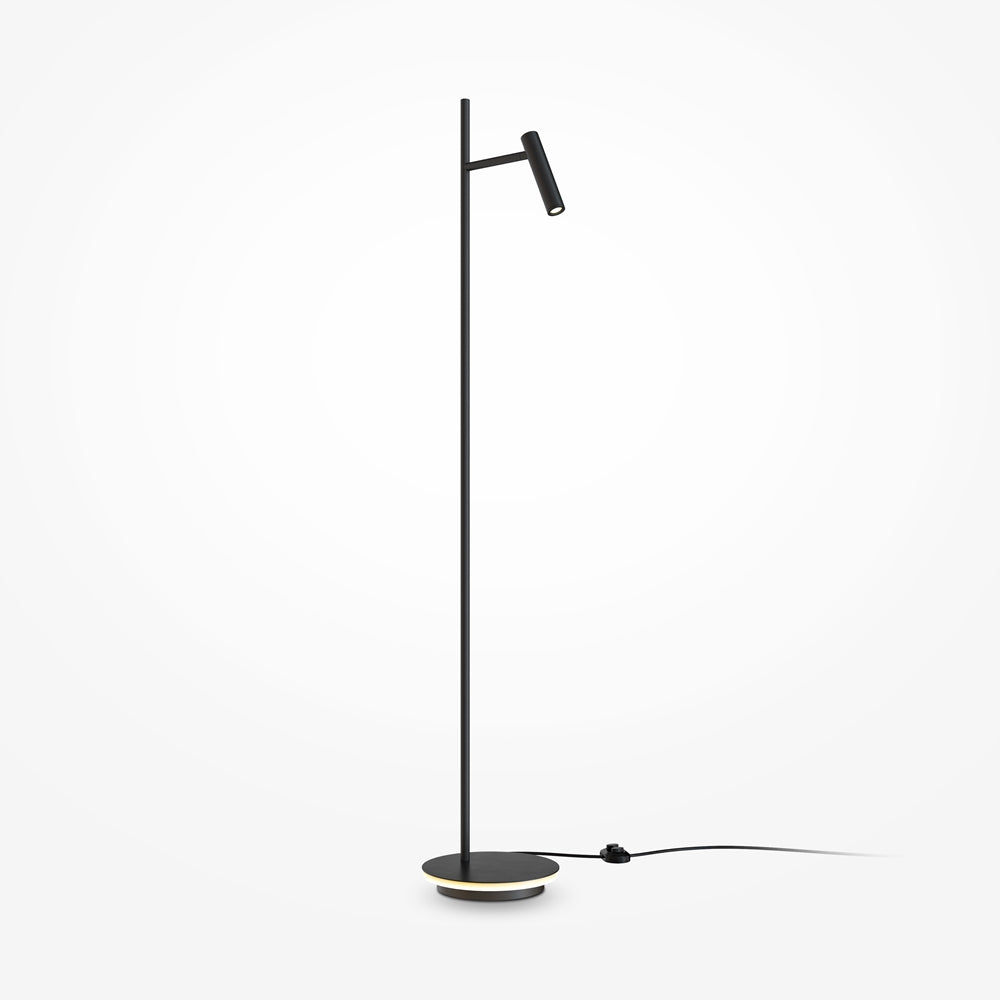 Lampadaire noir entier de face sur fond blanc, projecteur cylindrique incliné, câble visible.