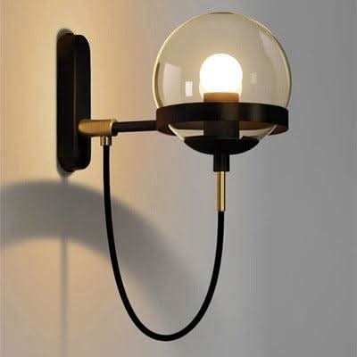 Version finition noire mate avec câble tressé formant une boucle sous le globe