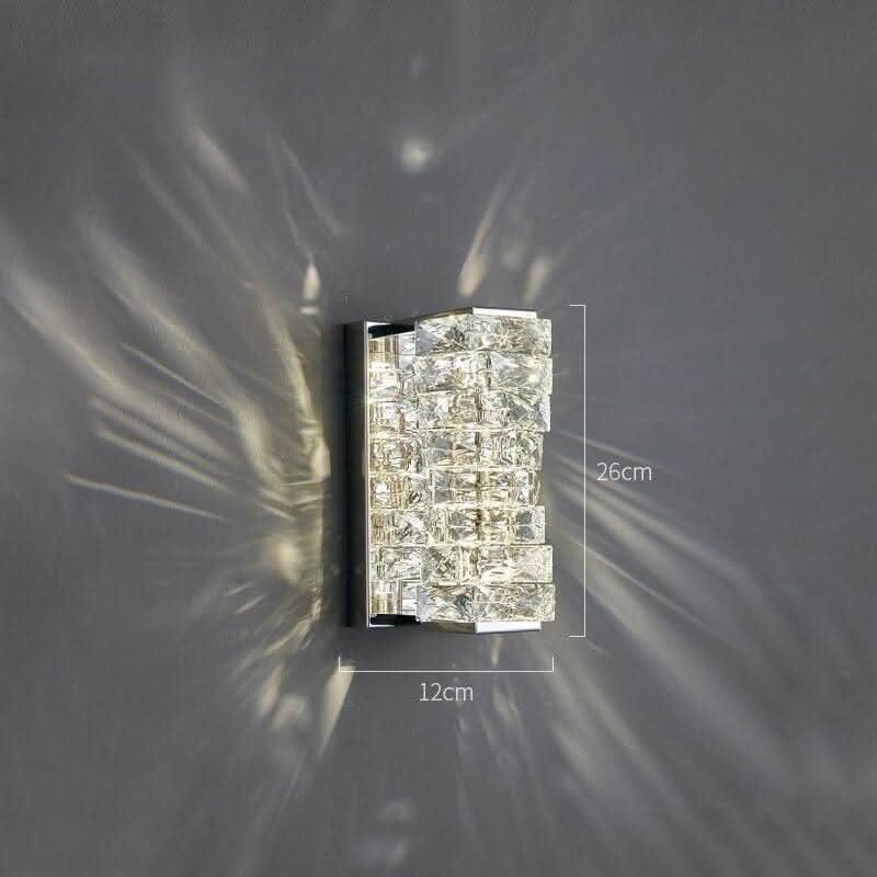 Schéma de dimensions du luminaire indiquant vingt-six centimètres sur douze