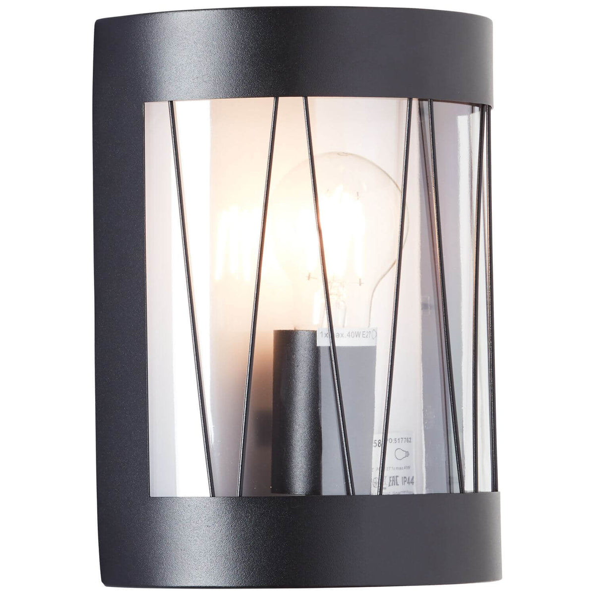 Applique extérieure noire de face avec ampoule allumée, verre transparent et tiges verticales.
