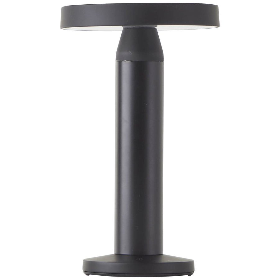 Luminaire allumé vu de trois quarts, éclairage rasante vers le bas