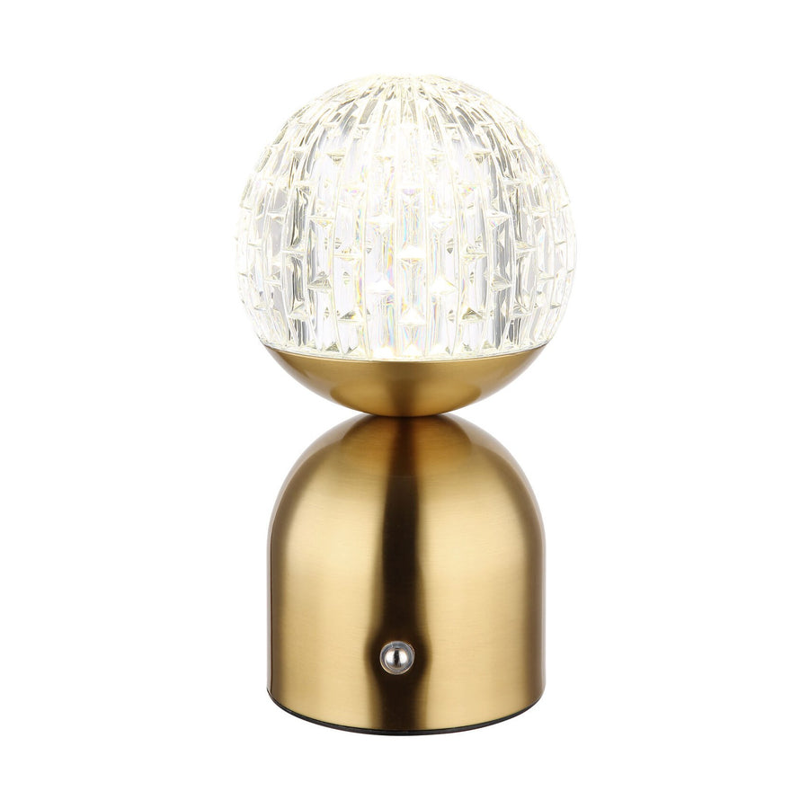 Lampe à poser en laiton avec globe en verre facetté, vue de face sur fond blanc