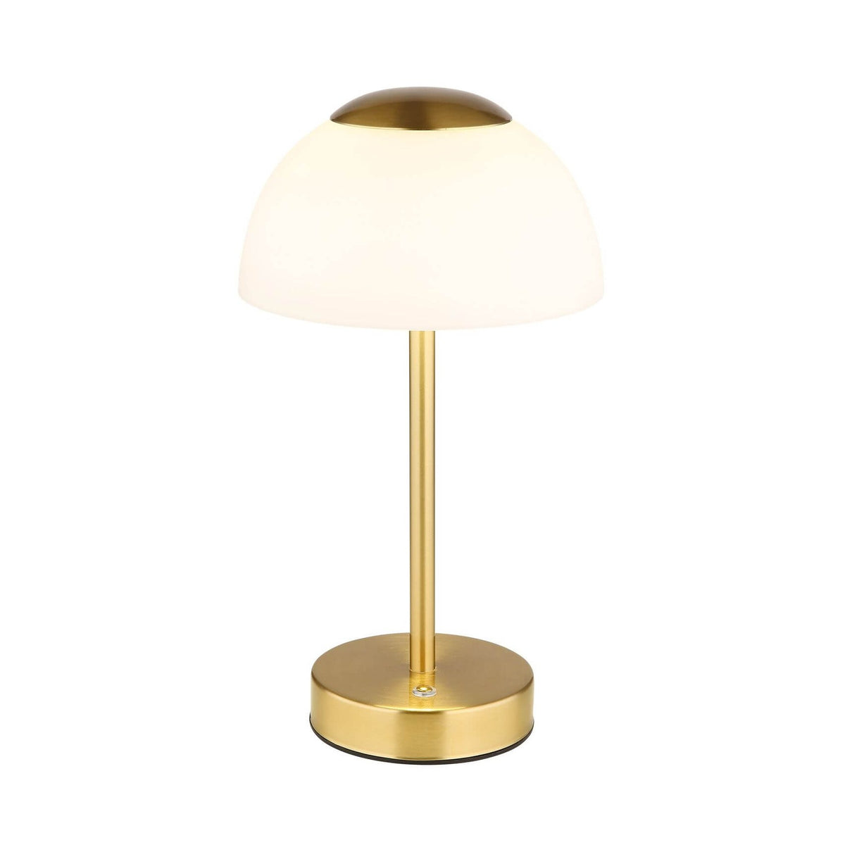 Lampe à poser de face sur fond blanc, abat-jour dôme ivoire et socle laiton