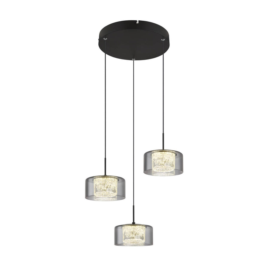 Suspension noire à trois abat-jours cylindriques en verre fumé, allumée sur fond blanc.