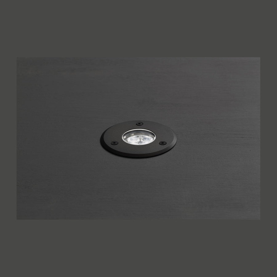 Vue de dessus du luminaire rond encastré, finition anthracite et trois vis.