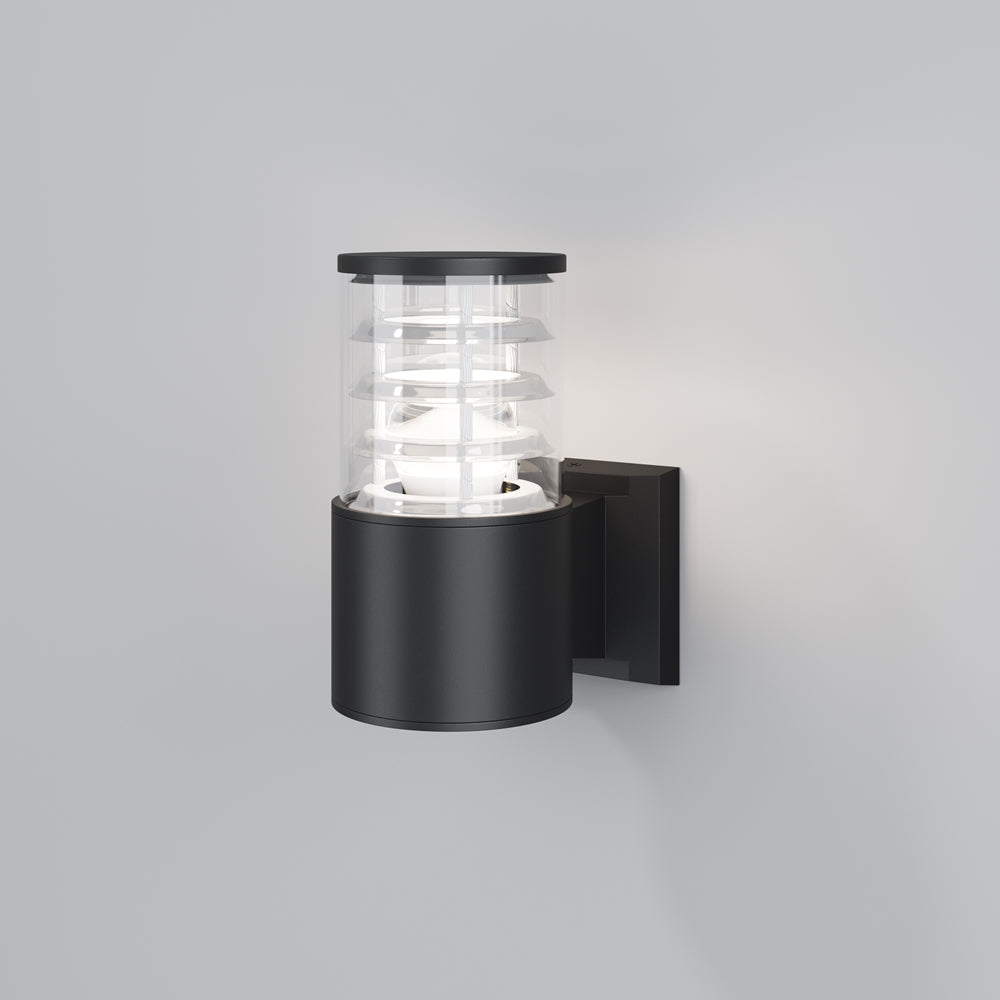 Applique murale noire vue de face, cylindre en verre transparent sur support mural carré