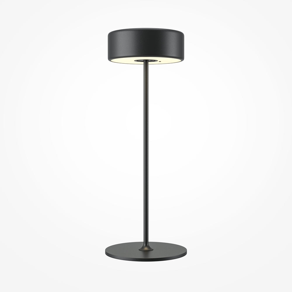 Lampe de chevet noire vue de face sur fond blanc, tige fine et socle rond