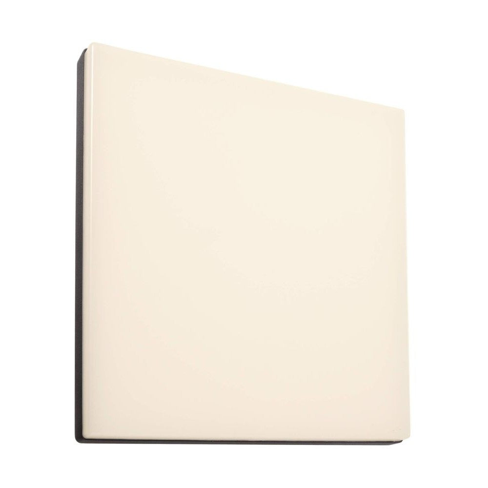 Vue de trois quarts du luminaire carré, face lumineuse blanche et bord gris.