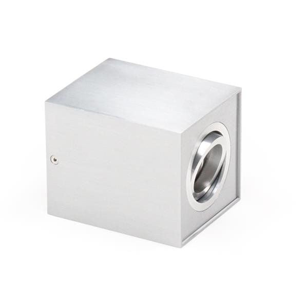 Vue de trois quarts du spot aluminium avec sortie latérale ronde et vis de fixation.