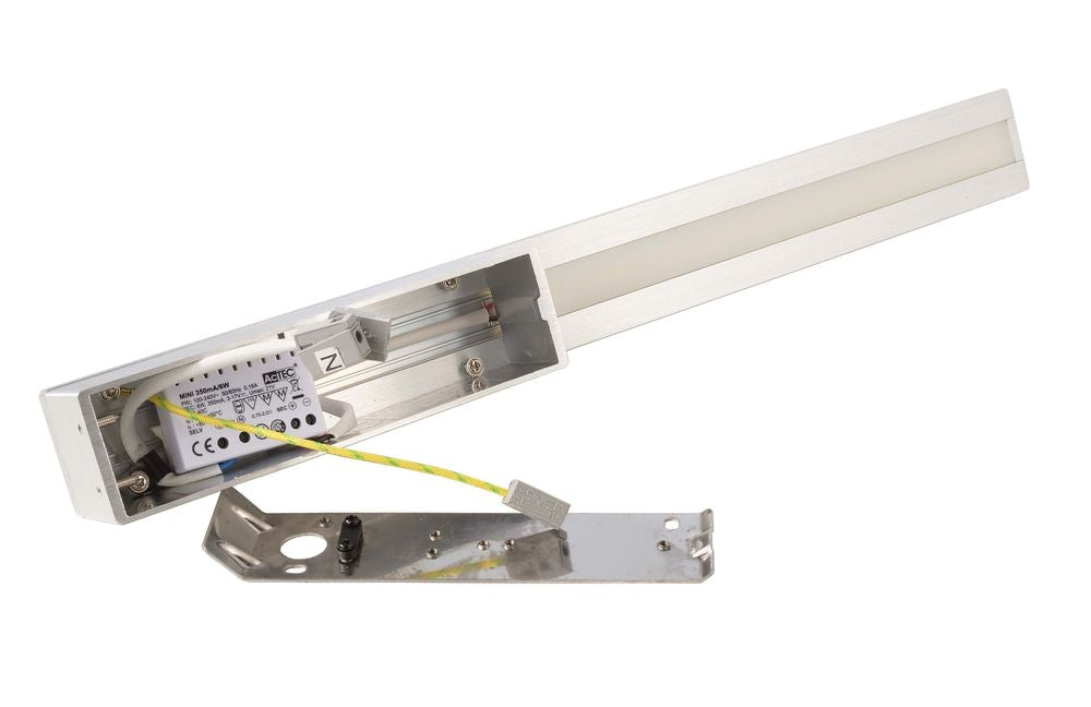 Détail du boîtier ouvert avec driver LED, câblage et platine de fixation métallique.