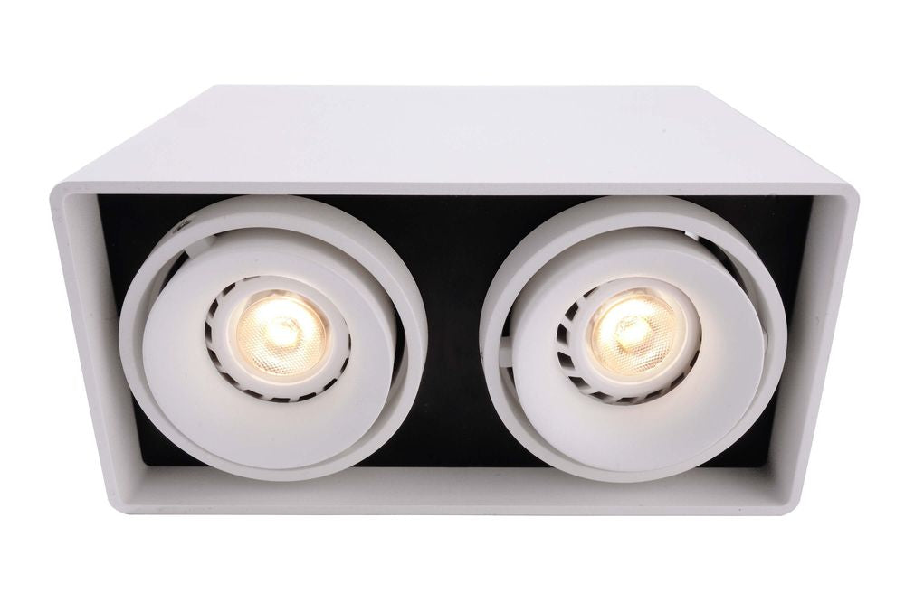 Face avant du luminaire blanc avec ses deux spots ronds allumés.