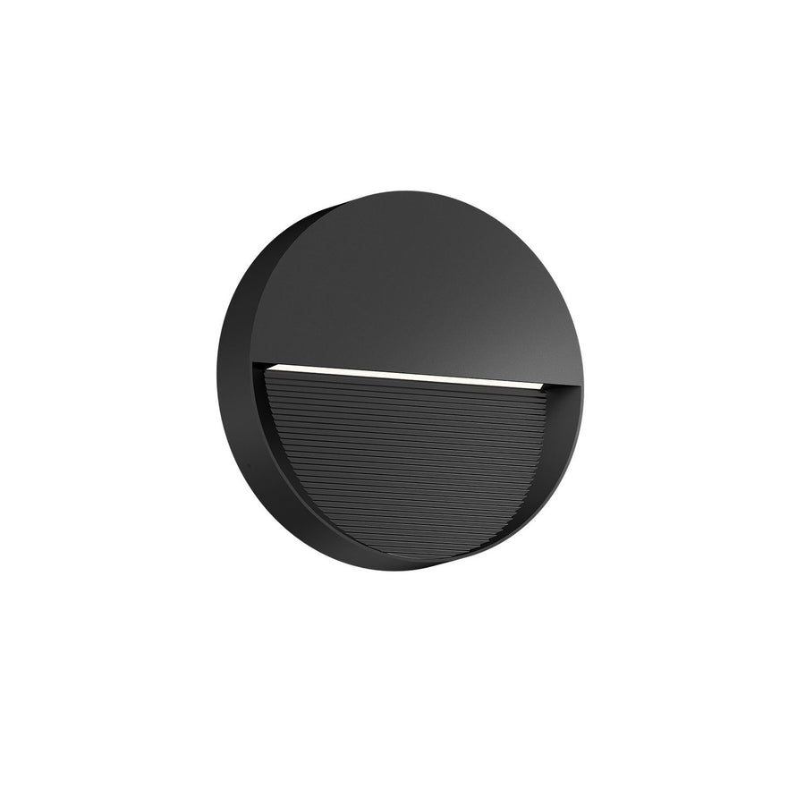 Vue de face de l'applique ronde noire avec diffuseur à lamelles
