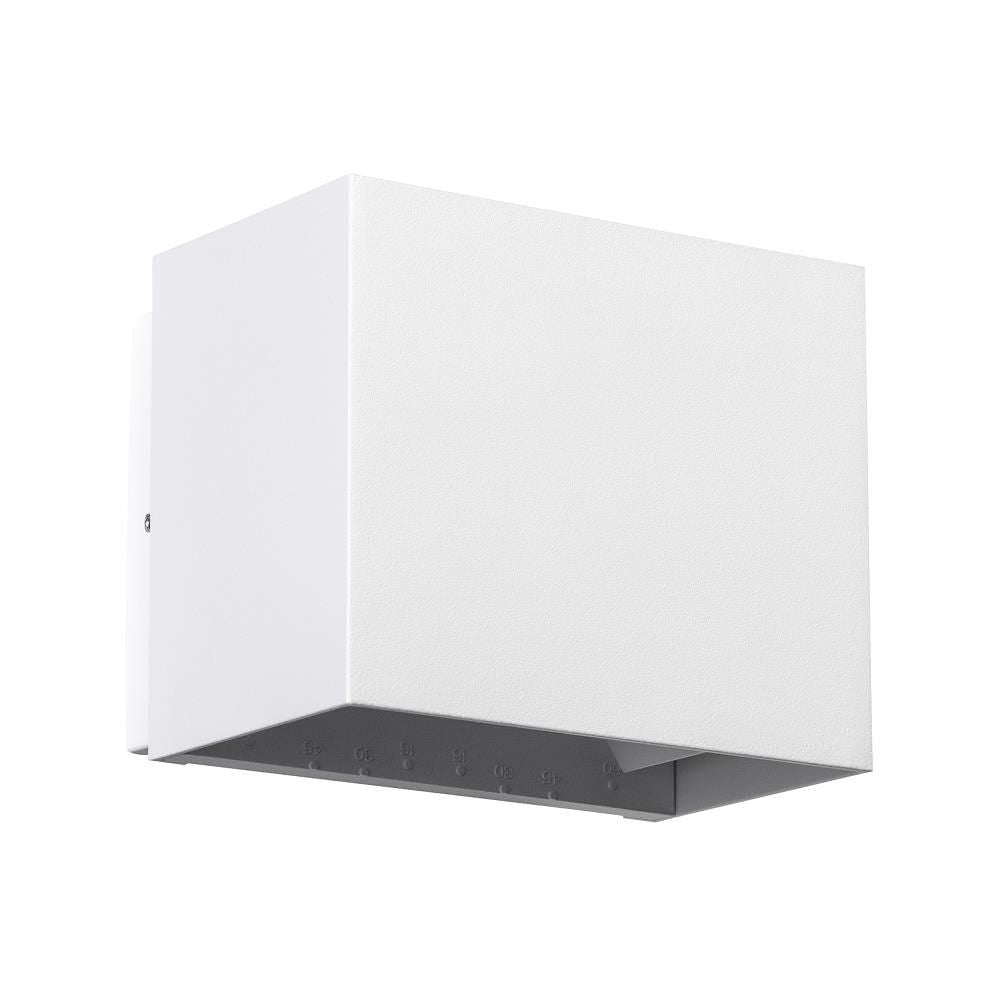 Applique blanche de face, boîtier cubique et grille de diffusion sous la base.