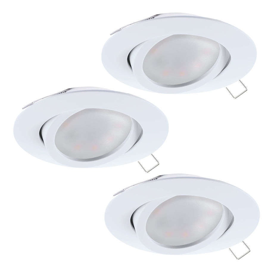 Trois spots blancs orientables présentés en série, ressorts de fixation apparents