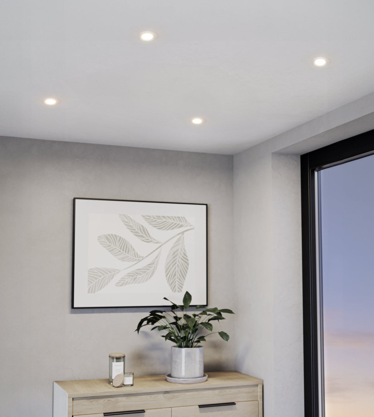 Mise en ambiance d'un plafond avec quatre spots encastrables éclairant un intérieur gris clair