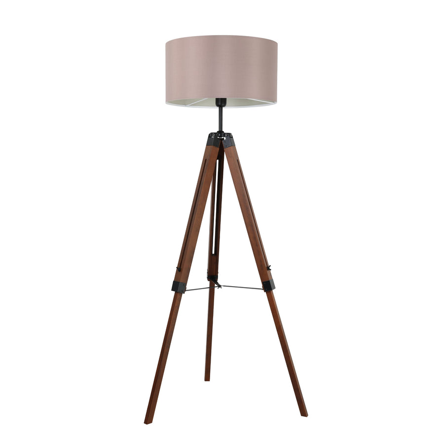 Vue de face du lampadaire trépied, pieds en bois et abat-jour rose pâle