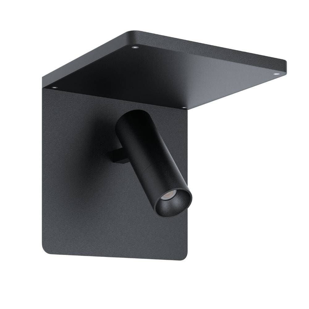 Vue de trois quarts d'une applique murale noire avec support rectangulaire et projecteur cylindrique orientable.