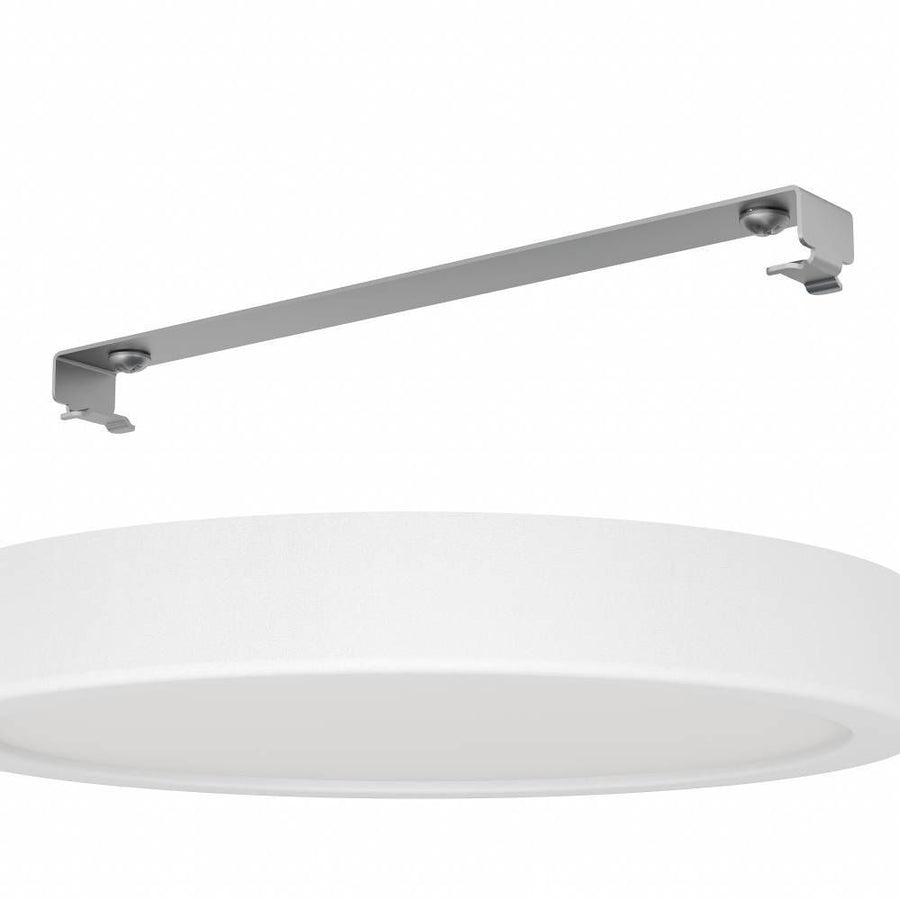 Vue éclatée montrant le diffuseur blanc et la platine de fixation métallique