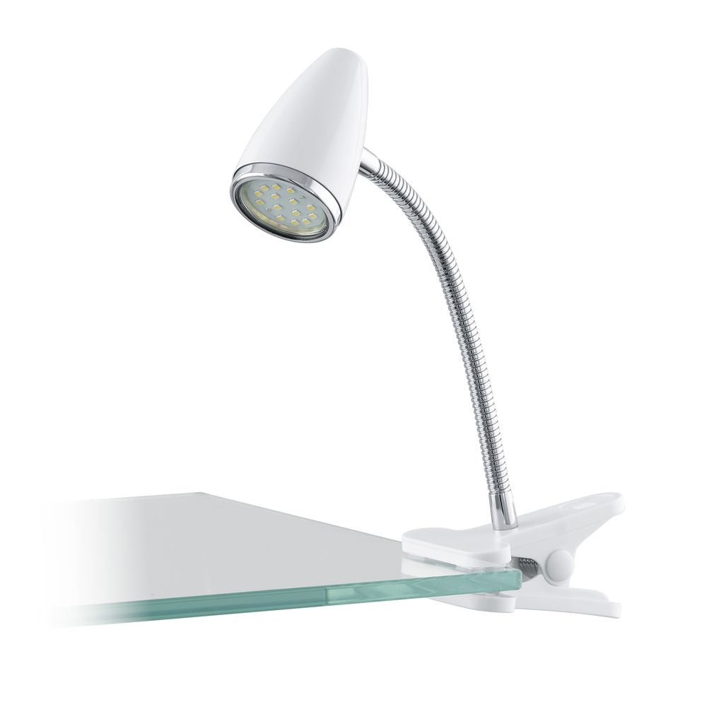 Lampe blanche et chromée fixée sur une plaque de verre, tête orientée vers le bas.