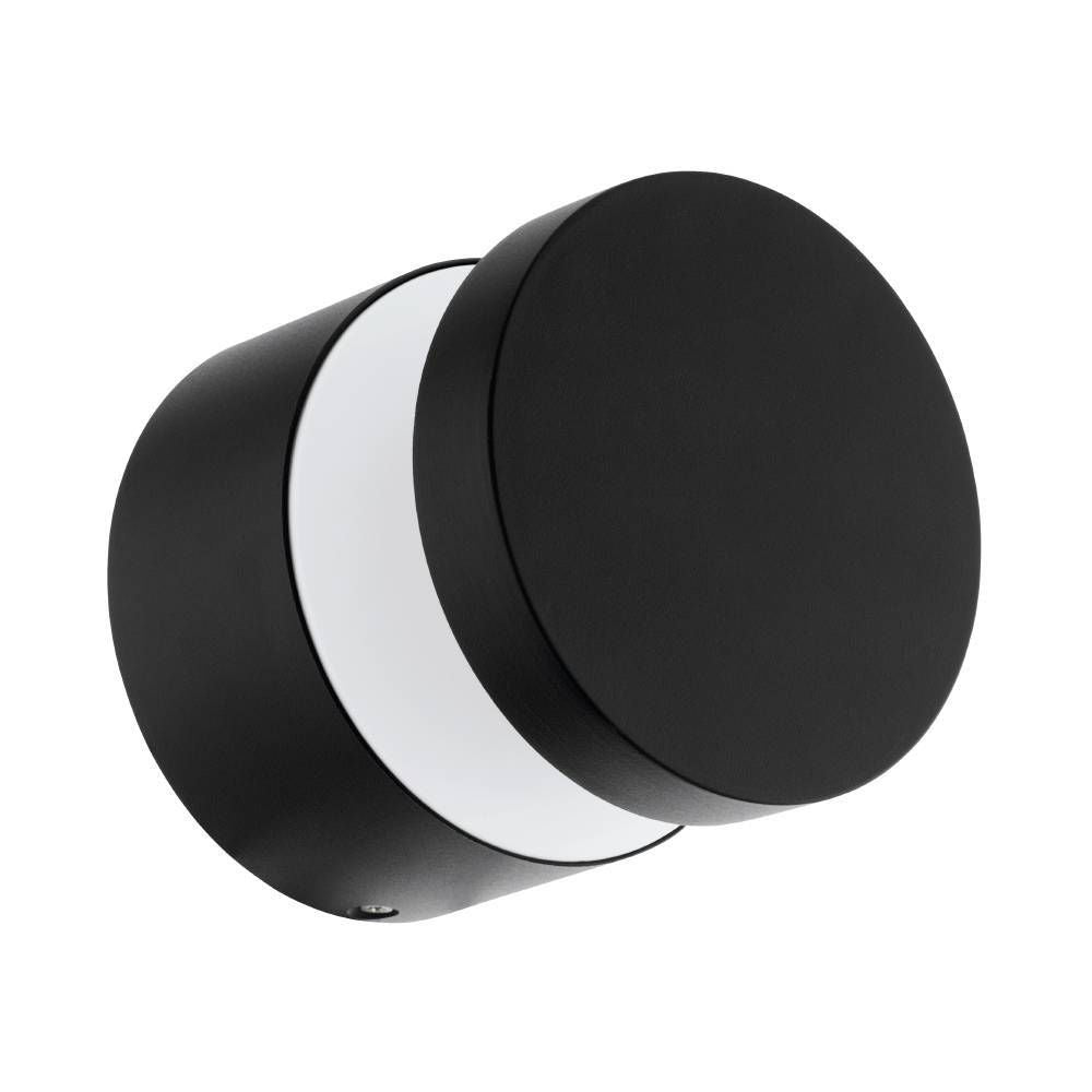 Vue rapprochée de l'applique murale cylindrique noire et son diffuseur blanc