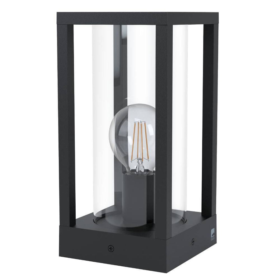 Lampadaire extérieur noir à structure rectangulaire et diffuseurs cylindriques, ampoule visible de face