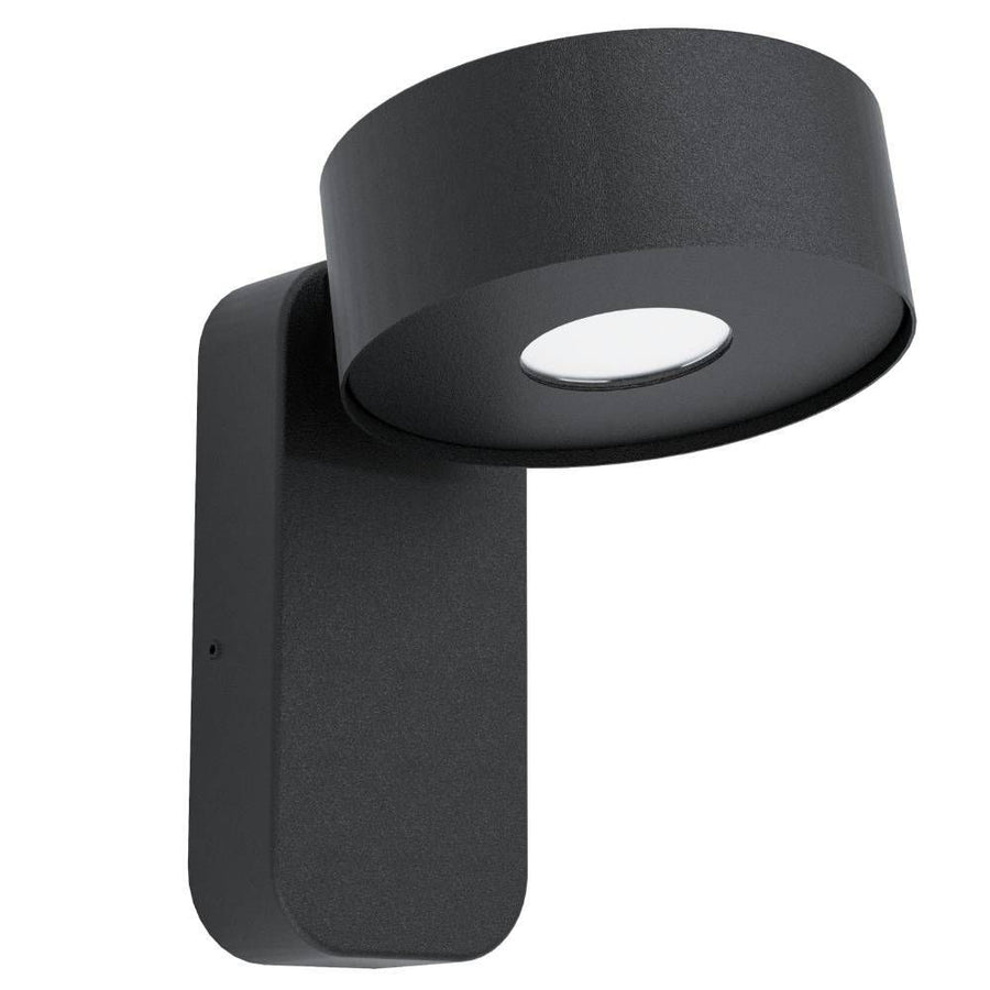 Vue de produit sur fond blanc, applique murale noire à tête cylindrique orientée vers le bas.