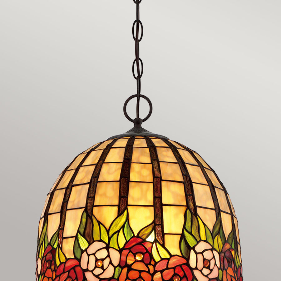 Détail du haut de l'abat-jour, chaîne bronze et verre ambré