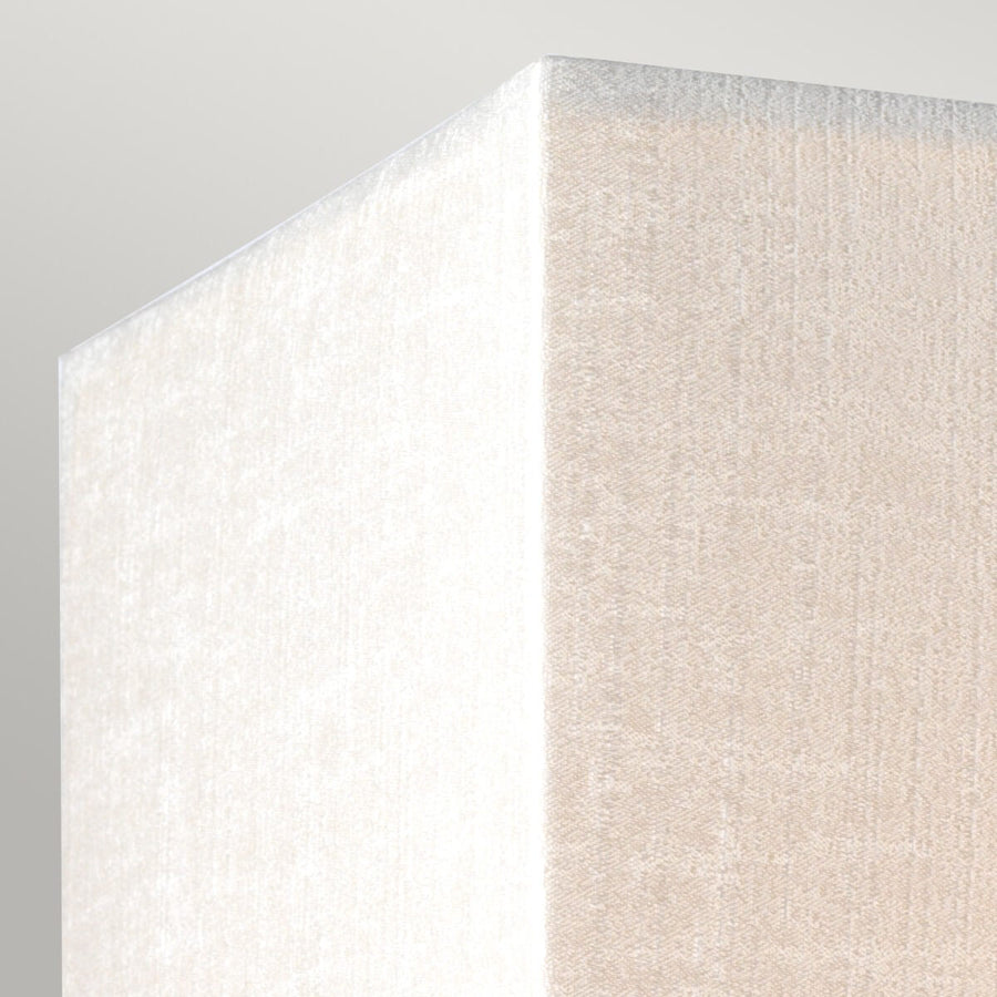 Détail d'angle de l'abat-jour, texture tissée fine et arête franche
