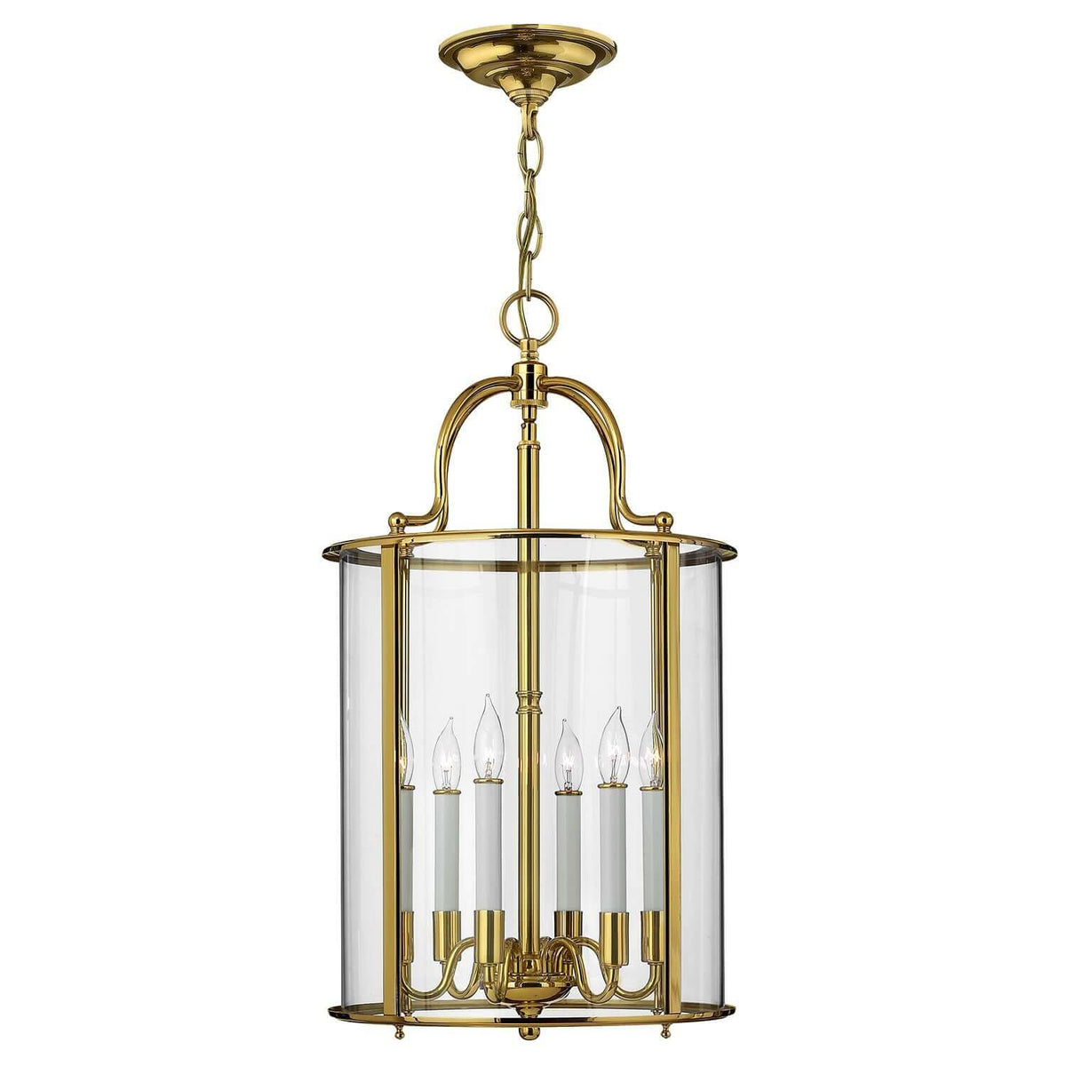 Suspension en laiton poli avec cylindre en verre et six ampoules bougies apparentes.