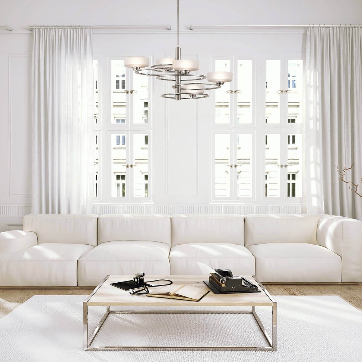 Mise en ambiance du luminaire suspendu dans un salon blanc contemporain