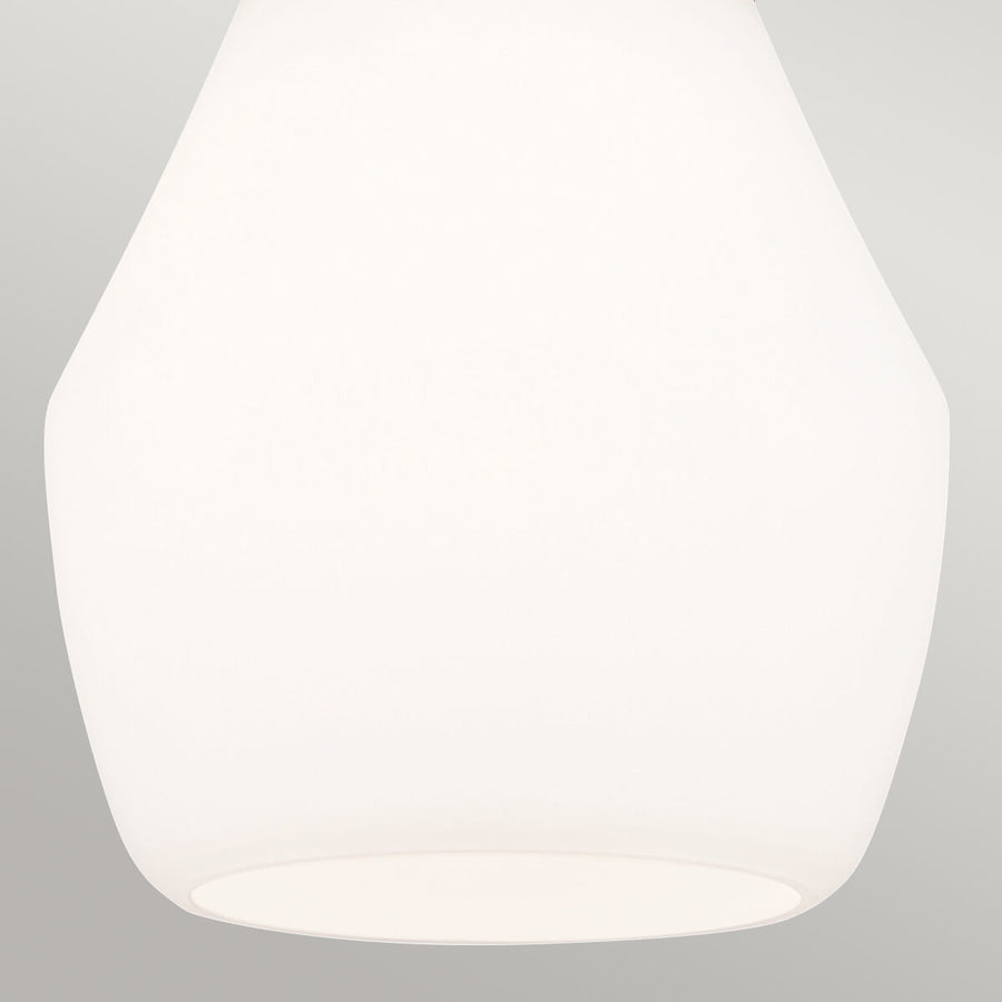 Détail du diffuseur en verre opale blanc et de son ouverture inférieure