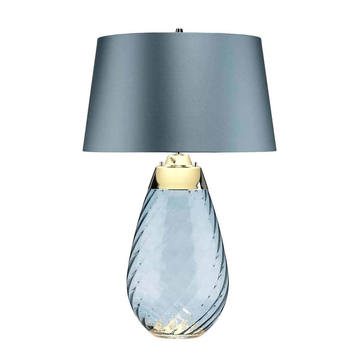 Face au socle doré, verre bleu facetté et abat-jour en tissu