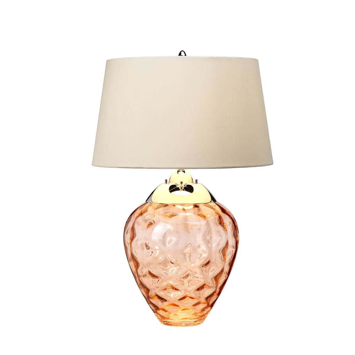 Luminaire présenté de face, cerclage doré et pied en verre teinté