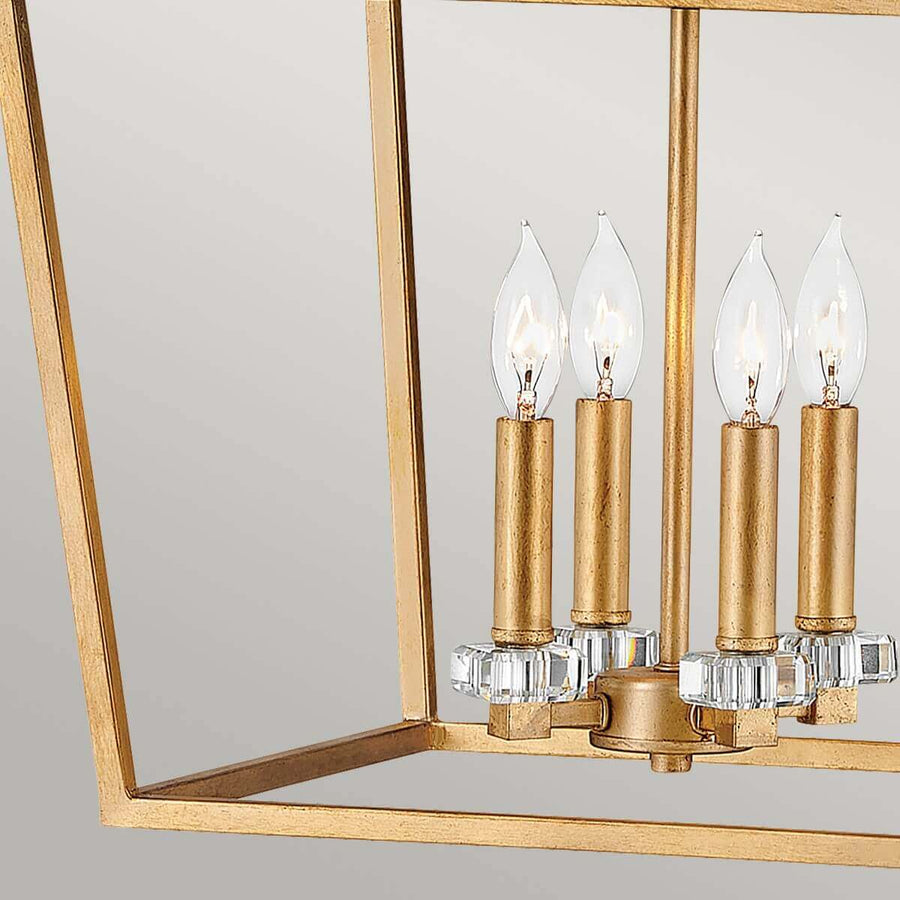 Détail du bas de la cage montrant les ampoules et la structure ouverte
