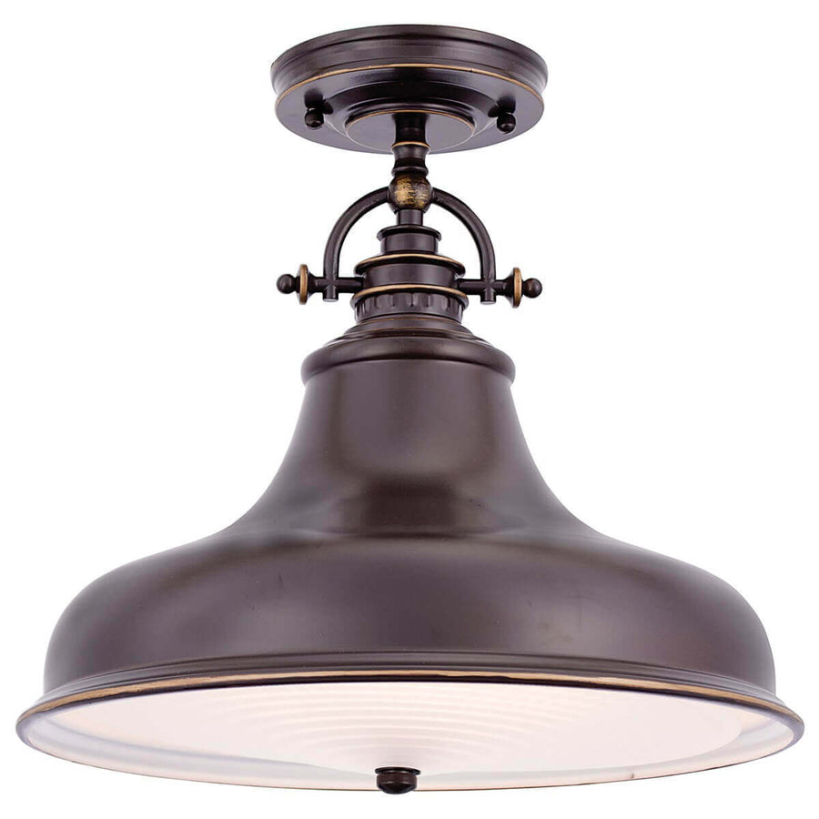 Vue de dessous montrant le diffuseur en verre et le cabochon central